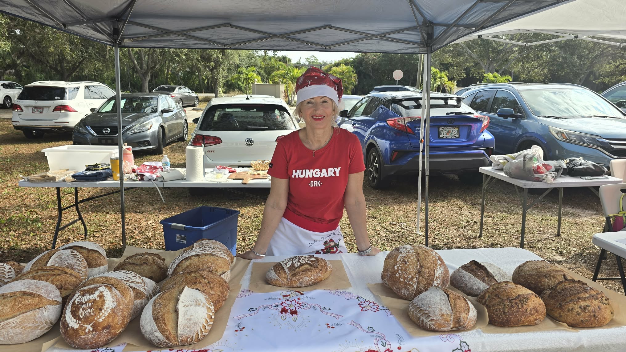Eva selling fresh sourdough loaves baked from this starter at a local farmers market.